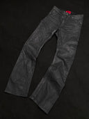 「CURVED BLADE」 Creased Waxed Spiral Curved-Leg Jeans