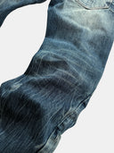 「TSUNAMI」 Lightning Fade Curved-Leg Jeans