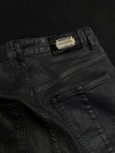 「CURVED BLADE」 Creased Waxed Spiral Curved-Leg Jeans