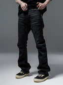 「CURVED BLADE」 Creased Waxed Spiral Curved-Leg Jeans