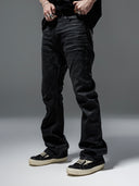 「CURVED BLADE」 Creased Waxed Spiral Curved-Leg Jeans