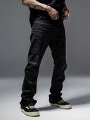 「CURVED BLADE」 Creased Waxed Spiral Curved-Leg Jeans