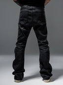 「CURVED BLADE」 Creased Waxed Spiral Curved-Leg Jeans