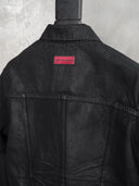 「RESTRAINT」Creased Waxed Denim Jacket with Contoured Seams