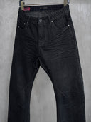 「LECTION」Laser-Patterned Waxed Spiral Jeans